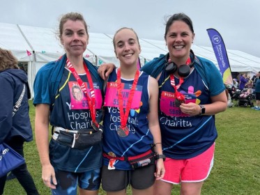 Three Runners with medals after run