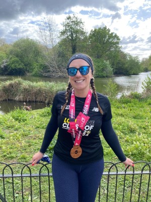 Charity supporter Amy, after a run with her medal