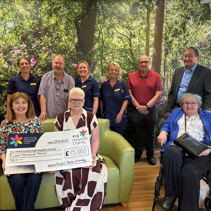 Randall and Palliative care team at cheque presentation