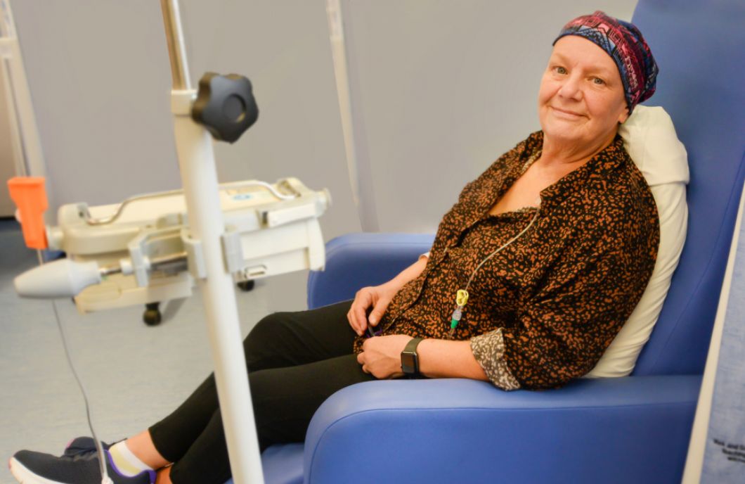 patient smiles in comfortable chair