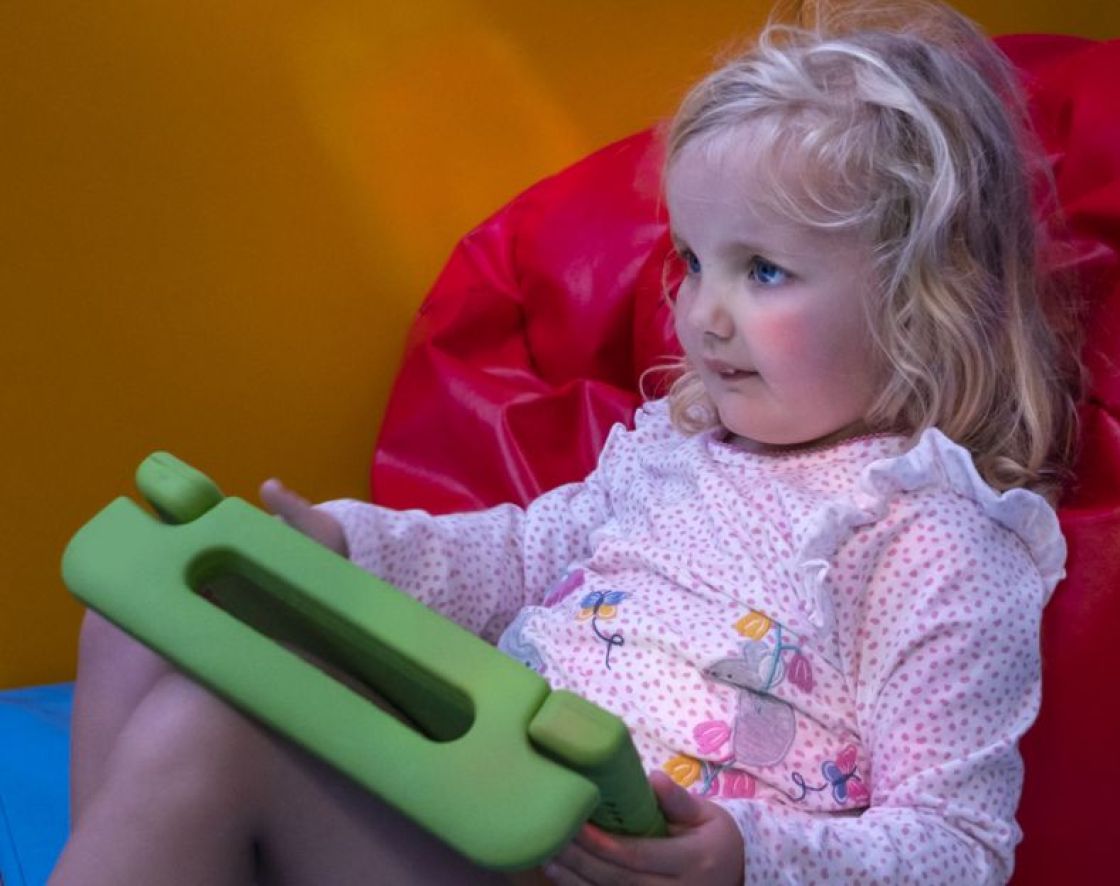 young girl with tablet