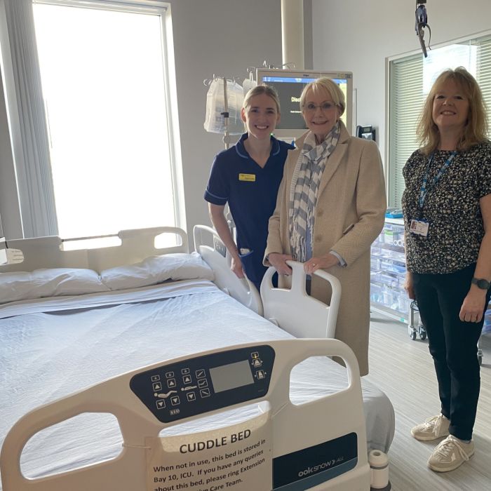 Local fundraiser, Denise Byas (pictured centre) with members of the palliative care team