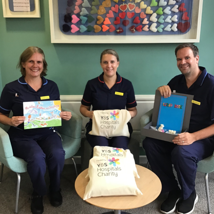 Bereavement team with items in the comfort packs